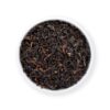 Bio Darjeeling SFTGFOP1 Classic Second Flush Blend mit schwarz-braunem Blatt und rotbrauner Tasse